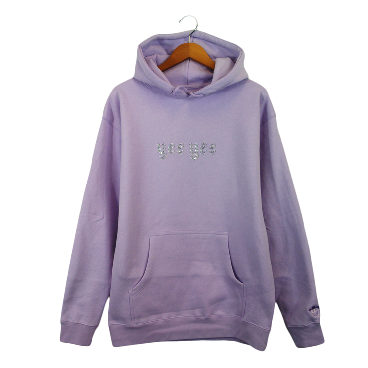 Lavender Hooded sweatshirt with "Yee Yee" in silver rhinestones on the front.  Purple cowboy emoji embroidered on the left sleeve of the sweatshirt. 